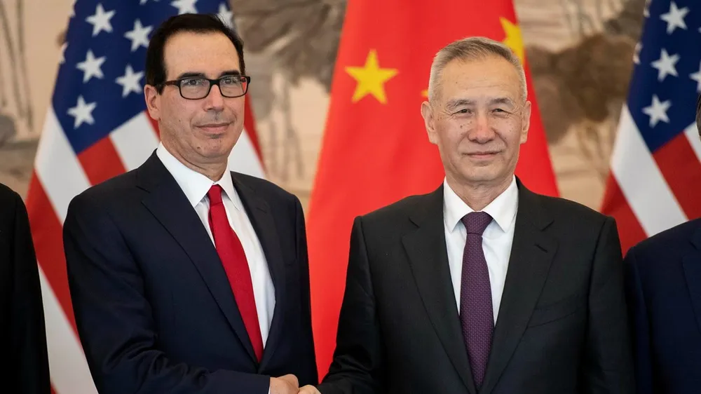 Phó Thủ tướng Trung Quốc Lưu Hạc (phải) và Bộ trưởng Tài chính Mỹ Steven Mnuchin (trái) trong cuộc gặp tại Bắc Kinh, Trung Quốc ngày 29-3-2019. Ảnh: AFP/TTXVN