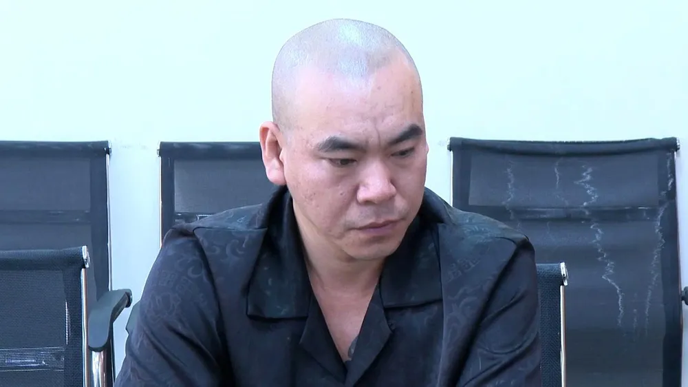 Phạm Huy Tuyền tại cơ quan công an. Ảnh: BỘ CÔNG AN