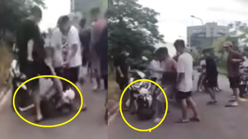 Thời điểm A. bị nhóm thanh thiếu niên hành hung trên đường. Ảnh: Cắt từ clip