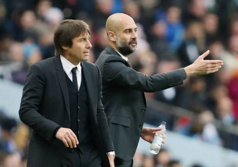 Antonio Conte (trái) không “ghen tị” với đồng nghiệp Pep Guardiola. Ảnh: Getty Images 