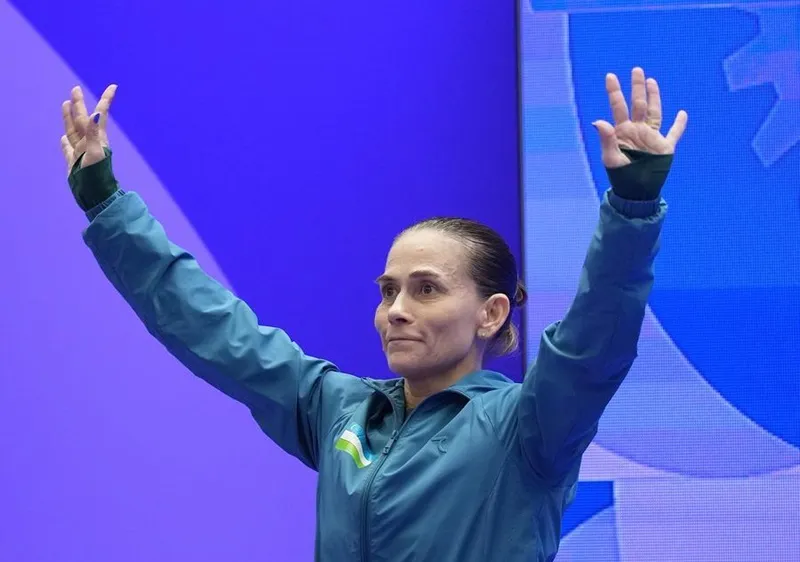 Huyền thoại Oksana Chusovitina đang tranh tài tại kỳ ASIAD thứ 7. Ảnh: THX
