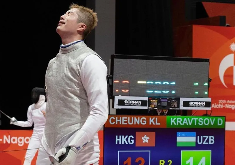Cheung Ka Long thất vọng tại ASIAD 20. Ảnh: THX