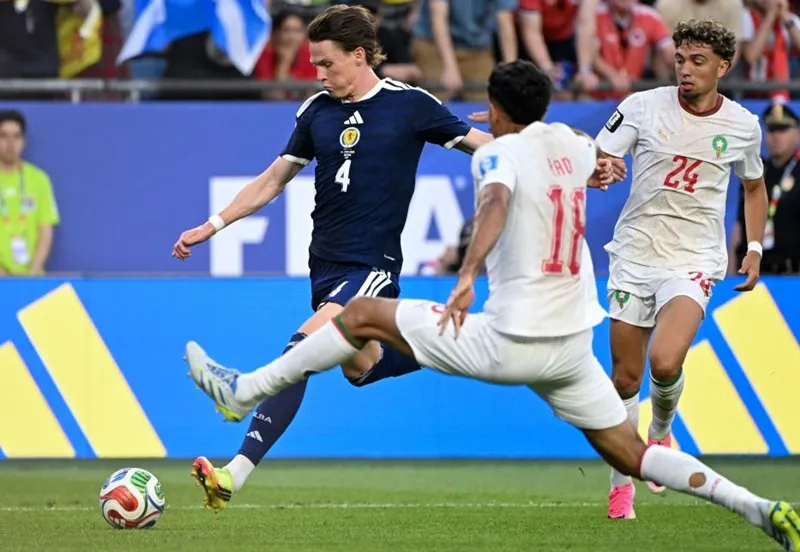 Scott McTominay (trái) chơi rất hay cho đội tuyển Scotland tại World Cup 2026. Ảnh: THX