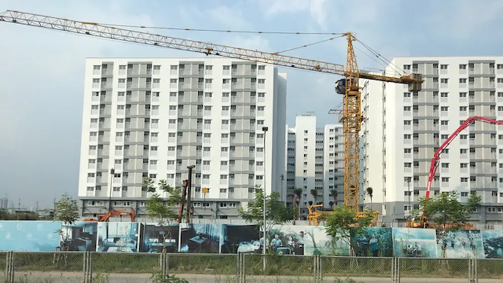 Sắp tới, các công trình xây dựng từ 9 tầng trở lên phải sử dụng tối thiểu 80% VLXKN Ảnh: HUY ANH
