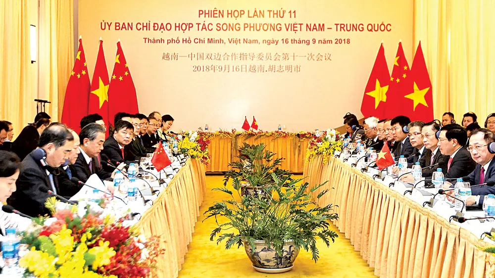 Đồng chí Phạm Bình Minh, Ủy viên Bộ Chính trị, Phó Thủ tướng Chính phủ, Bộ trưởng Bộ Ngoại giao và Ủy viên Quốc vụ, Bộ trưởng Bộ Ngoại giao Trung Quốc Vương Nghị đồng chủ trì Phiên họp lần thứ 11 Ủy ban Chỉ đạo hợp tác song phương Việt Nam - Trung Quốc. 