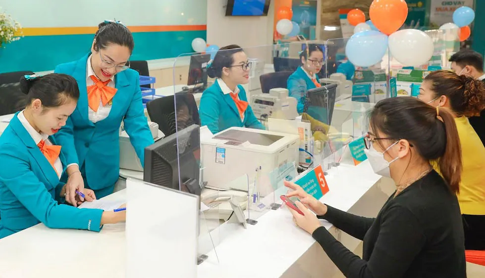 Sự bứt phá của tín dụng dịp cuối năm 2021 đã thúc đẩy lợi nhuận ngân hàng tăng mạnh. Ảnh: PHAN LÊ 