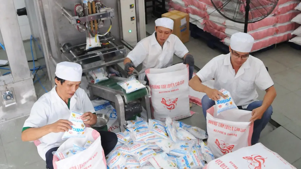 Sản xuất đường tại Công ty cổ phần Công nghệ thực phẩm Sài Gòn. Ảnh: CAO THĂNG