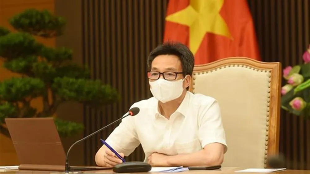  Phó Thủ tướng Chính phủ Vũ Đức Đam, Trưởng Ban Chỉ đạo Quốc gia phòng, chống dịch COVID-19, chủ trì cuộc họp trực tuyến. Ảnh: TTXVN
