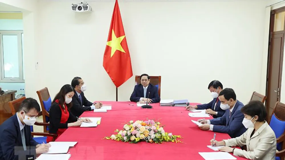 Thủ tướng Phạm Minh Chính phát biểu tại buổi điện đàm. ẢNh: TTXVN