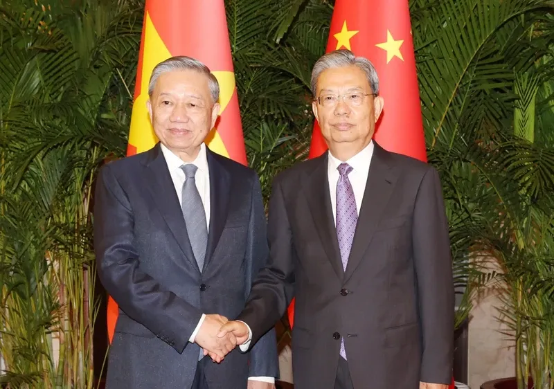 Tổng Bí thư, Chủ tịch nước Tô Lâm hội kiến Ủy viên trưởng Nhân đại toàn quốc Trung Quốc Triệu Lạc Tế. Ảnh: TTXVN