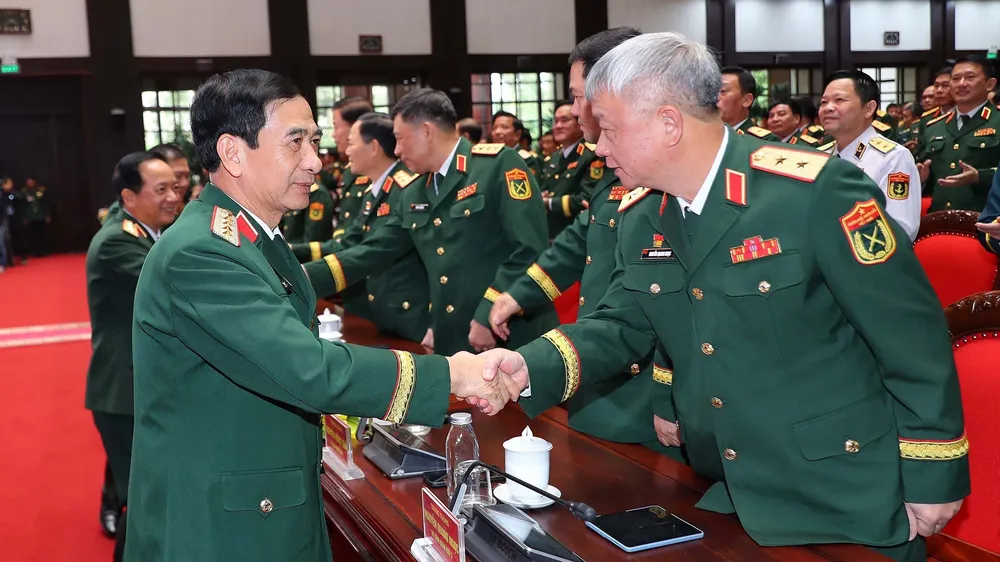 Đại tướng Phan Văn Giang, Phó Bí thư Quân ủy Trung ương, Bộ trưởng Bộ Quốc phòng và các đại biểu dự buổi lễ. Ảnh: TTXVN