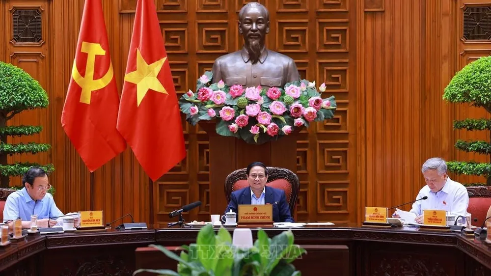 Thủ tướng Phạm Minh Chính chủ trì cuộc họp Thường trực Chính phủ về trung tâm tài chính quốc tế tại Thành phố Hồ Chí Minh và Đà Nẵng. Ảnh: TTXVN