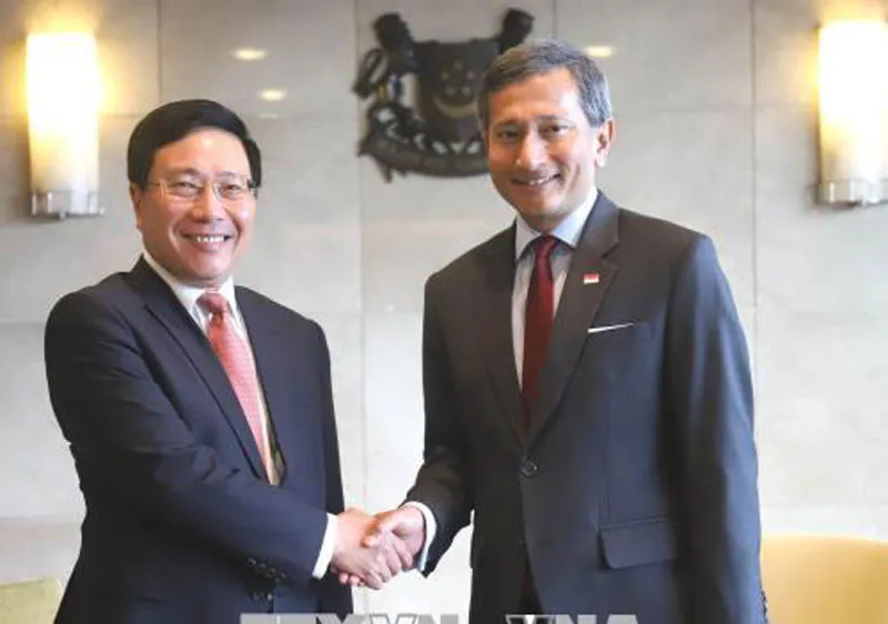 Phó Thủ tướng, Bộ trưởng Ngoại giao Phạm Bình Minh và Bộ trưởng Ngoại giao Singapore Vivian Balakrishnan (Nguồn: TTXVN) 