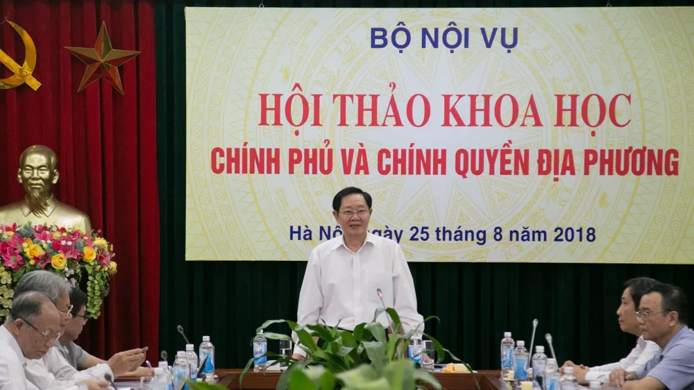 Bộ trưởng Bộ Nội vụ Lê Vĩnh Tân phát biểu khai mạc Hội thảo. Nguồn TCNN.VN