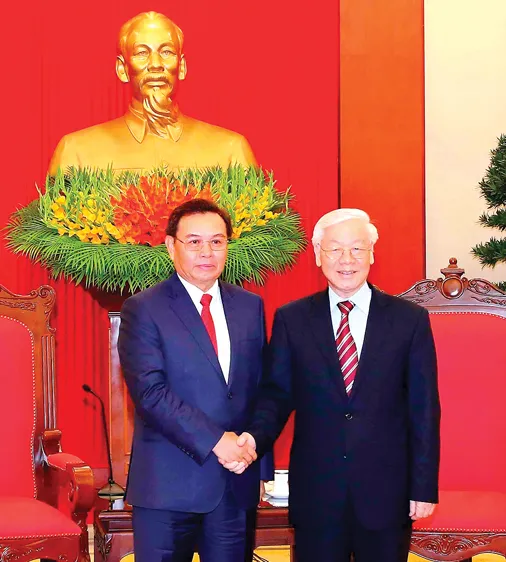 Tổng Bí thư Nguyễn Phú Trọng tiếp đồng chí Saysomphone Phomvihane, Ủy viên Bộ Chính trị, Chủ tịch Ủy ban Trung ương Mặt trận Lào xây dựng đất nước