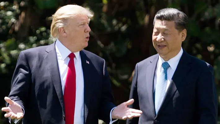 Tổng thống Mỹ Donald Trump (trái) và Chủ tịch Trung Quốc Tập Cận Bình - Ảnh: Getty.