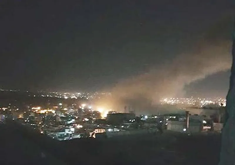 Một cơ sở được cho là nghiên cứu hóa học ở Syria bị tấn công. Ảnh: Twitter đăng trên Theguardian