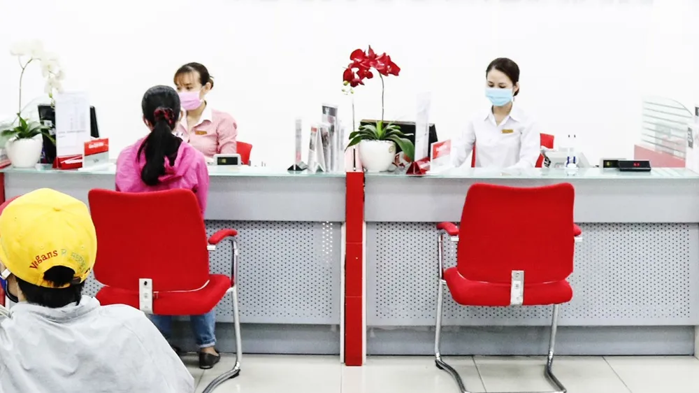 Nhiều ngân hàng vẫn cho vay bất động sản nhưng không cào bằng. Ảnh: PHAN LÊ