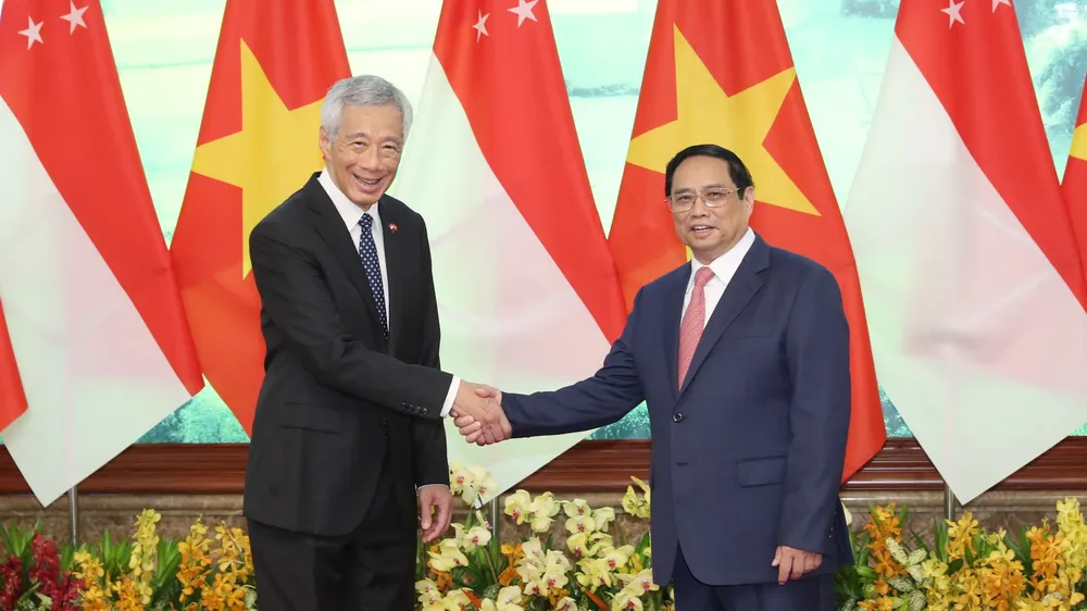 Thủ tướng Phạm Minh Chính và Thủ tướng Singapore Lý Hiển Long. Ảnh: QUANG PHÚC