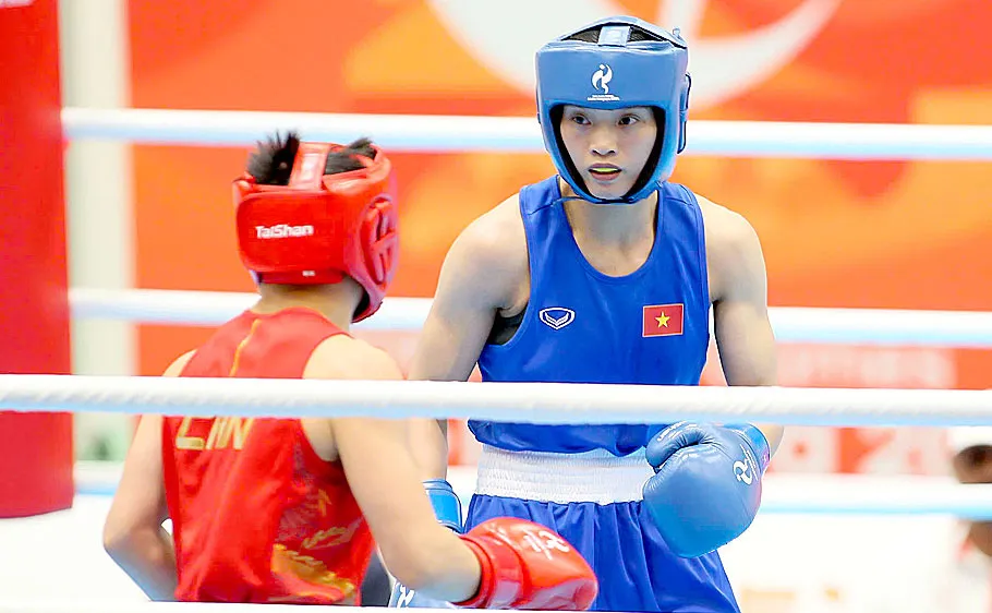 Võ sĩ Nguyễn Thị Tâm giành huy chương bạc ASIAD 20, có khả năng cạnh tranh môn boxing ở đấu trường Olympic. Ảnh: TÂM MINH