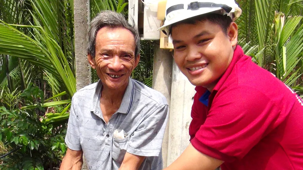 Ông Trần Văn Thanh, người dân huyện Cần Giờ vui mừng khi nước sạch được kéo đến nhà