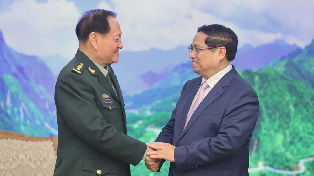 Thủ tướng Phạm Minh Chính tiếp Thượng tướng Trương Hựu Hiệp, Ủy viên Bộ Chính trị, Phó Chủ tịch Quân ủy Trung ương Trung Quốc, sáng 26-10. Ảnh: VIẾT CHUNG