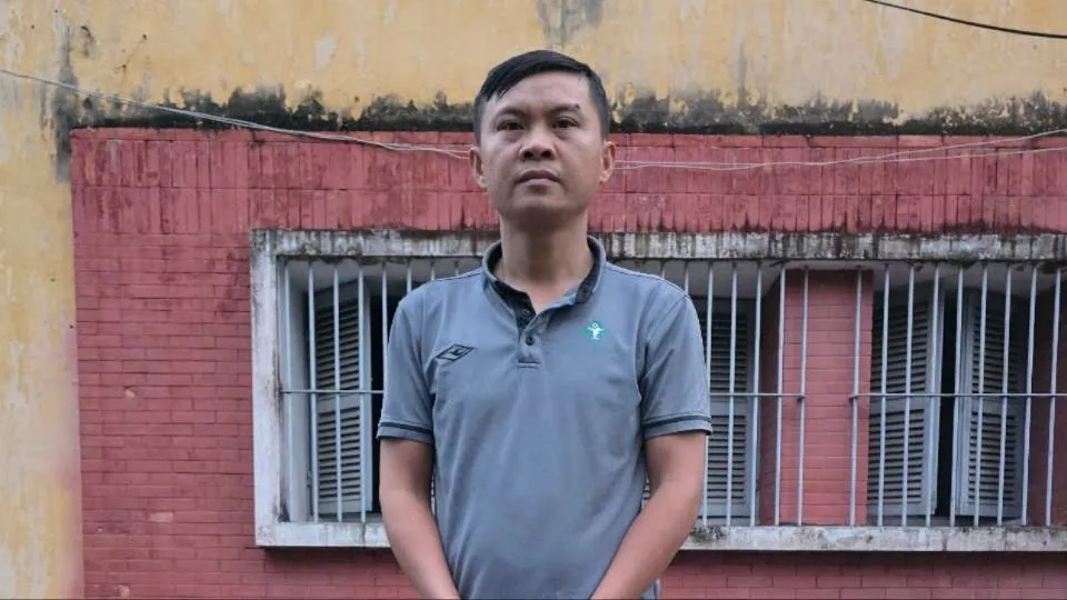 Trần Thanh Minh tại cơ quan công an 