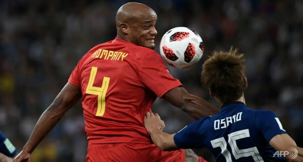 Vincent Kompany (ttrái) trong trận găp Nhật Bản.