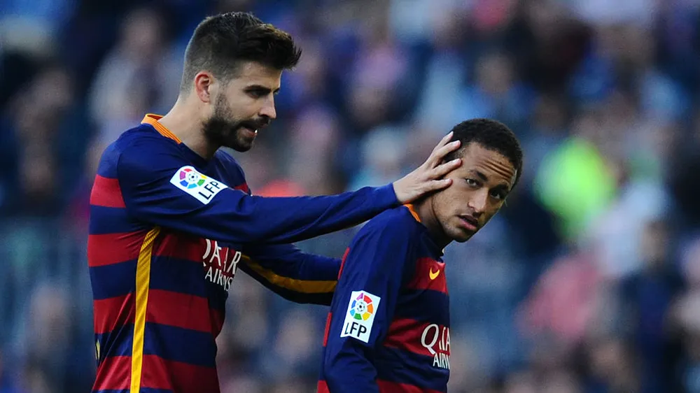 Gerard Pique và Neymar trong màu áo Barca.