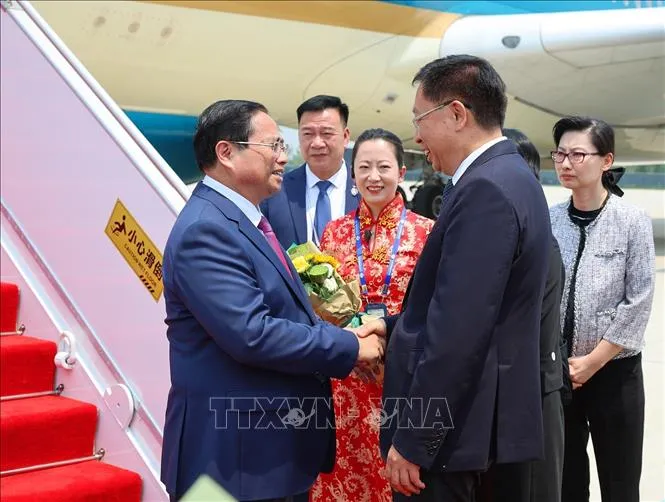 Lễ đón Thủ tướng Phạm Minh Chính tại Sân bay quốc tế Tân Hải, thành phố Thiên Tân, Trung Quốc. Ảnh : TTXVN