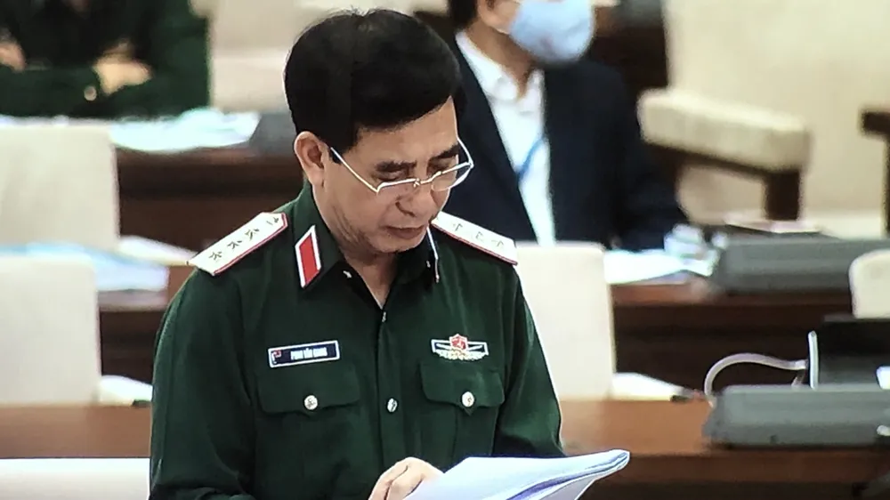 Thượng tướng Phan Văn Giang trình bày Tờ trình của Chính phủ về dự án Luật Biên phòng Việt Nam