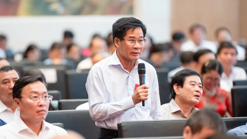 Kiểm toán trưởng Kiểm toán Nhà nước chuyên ngành II Lê Đình Thăng phát biểu tại diễn đàn. Ảnh: PHẠM THẮNG 