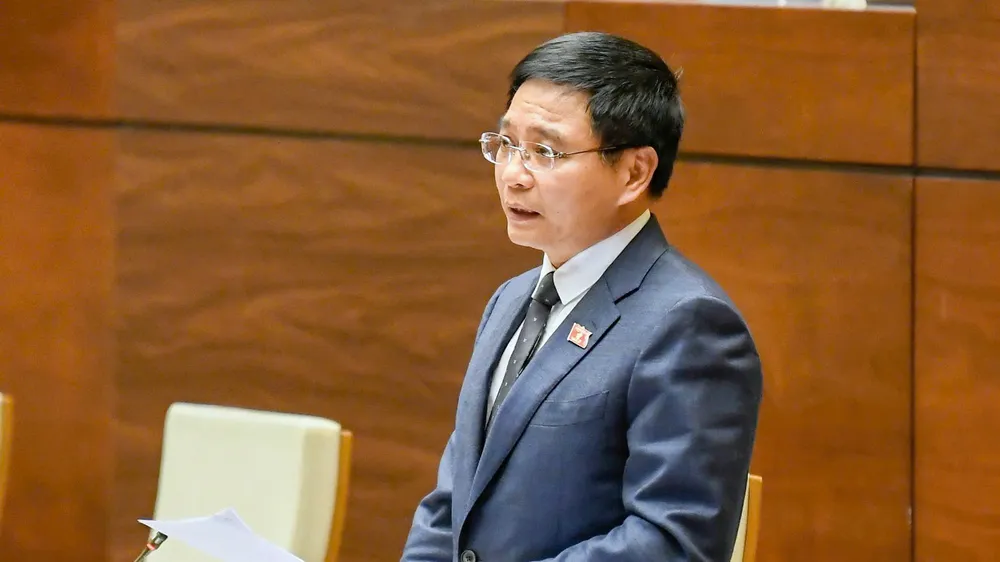 Bộ trưởng Bộ Tài chính Nguyễn Văn Thắng phát biểu giải trình, làm rõ một số vấn đề đại biểu Quốc hội nêu, chiều 9-12. Ảnh: VIẾT CHUNG 