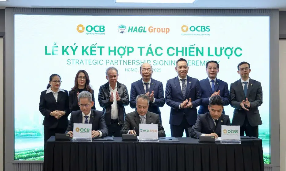 OCB, OCBS và HAGL ký kết hợp tác chiến lược thúc đẩy tài chính xanh ngày 25-11. Ảnh: NHUNG NGUYỄN