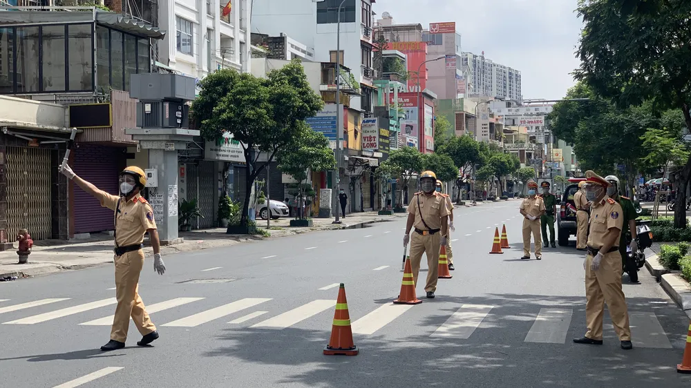 Công an quận 3, đảm bảo giao thông thông thoáng trên các tuyến đường trên địa bàn. Ảnh: CHÍ THẠCH 