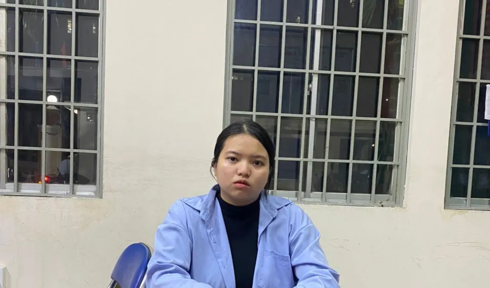Đối tượng Vy tại cơ quan công an. Ảnh: C.T