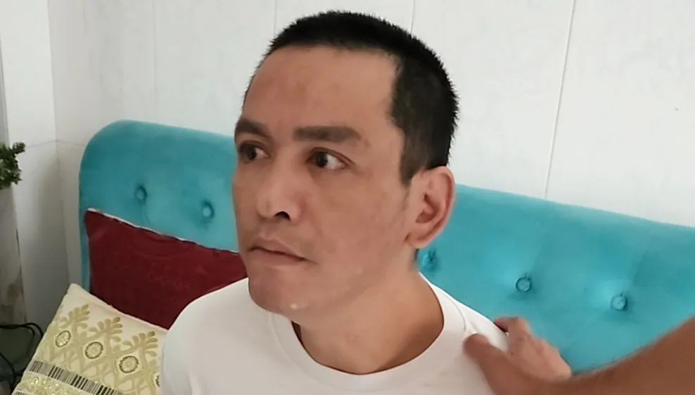 Trí lúc bị bắt. Ảnh: C.T