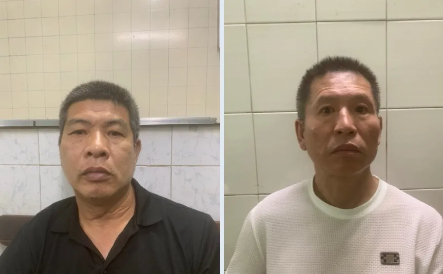 Hai đối tượng Qin Haibo và Chen Xingao tại cơ quan công an