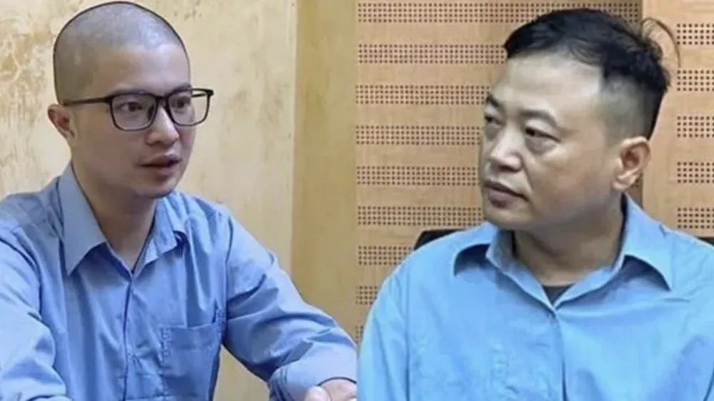 Các bị cáo: Phó Đức Nam và Nguyễn Hòa Bình tại cơ quan điều tra. Ảnh: CÔNG AN HÀ NỘI