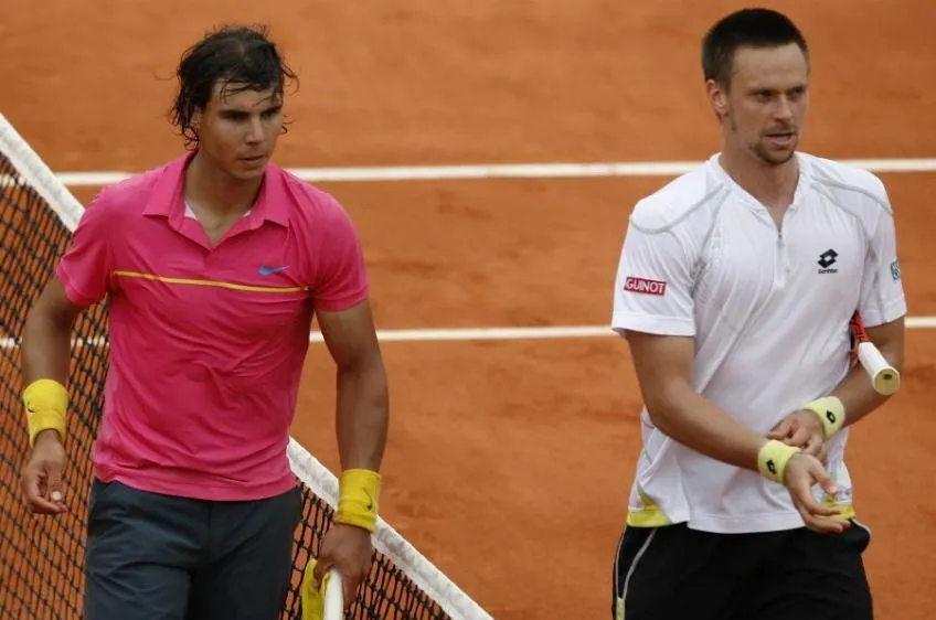 Soderling (áo trắng) sau chiến thắng kinh điển trước Nadal ở Rolang Garros 2009