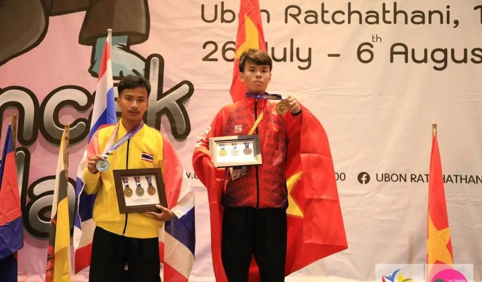 Võ sĩ Thanh Phong giành tấm HCV cho Đoàn thể thao sinh viên Việt Nam ở môn pencak silat. Ảnh: BTC
