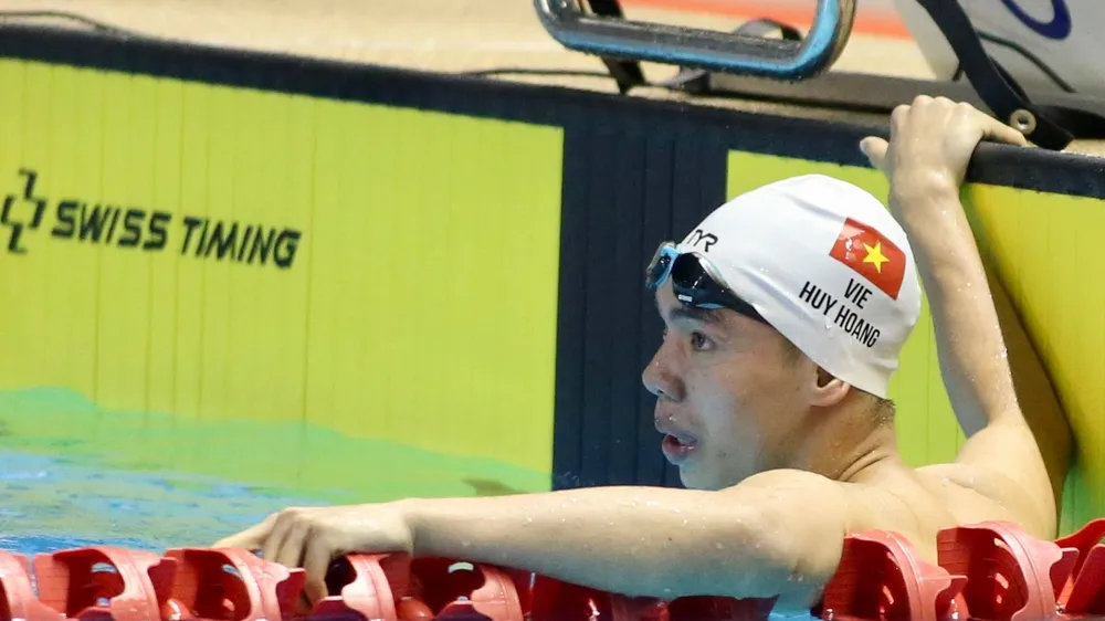 Huy Hoàng đã có tấm HCĐ 200m tự do. Ảnh: DŨNG PHƯƠNG