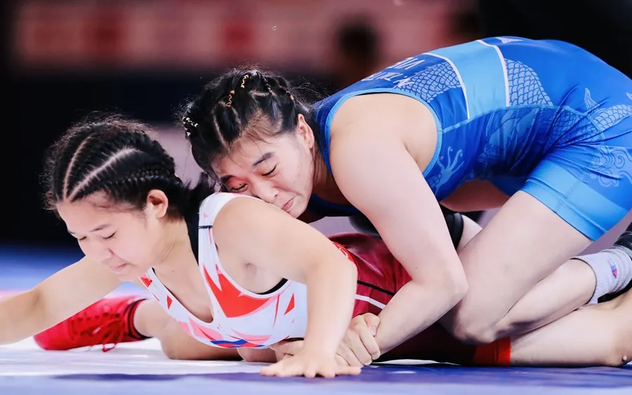 Mỹ Trang (xanh) đã nỗ lực nhưng chưa thành công ở giải vòng loại Olympic của châu Á. Ảnh: DŨNG PHƯƠNG