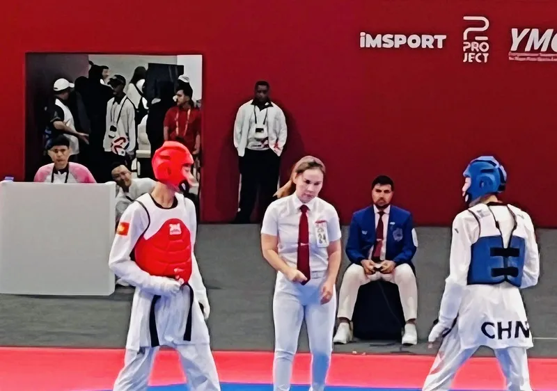 Tuyển thủ taekwondo Việt Nam tranh tài tại Bahrain. Ảnh: TRUNG THÀNH