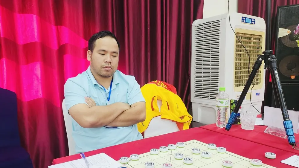 Kỳ thủ Nguyễn Minh Nhật Quang của TPHCM đã giành HCV trong nội dung cờ siêu chớp và cờ chớp. Ảnh: VXF
