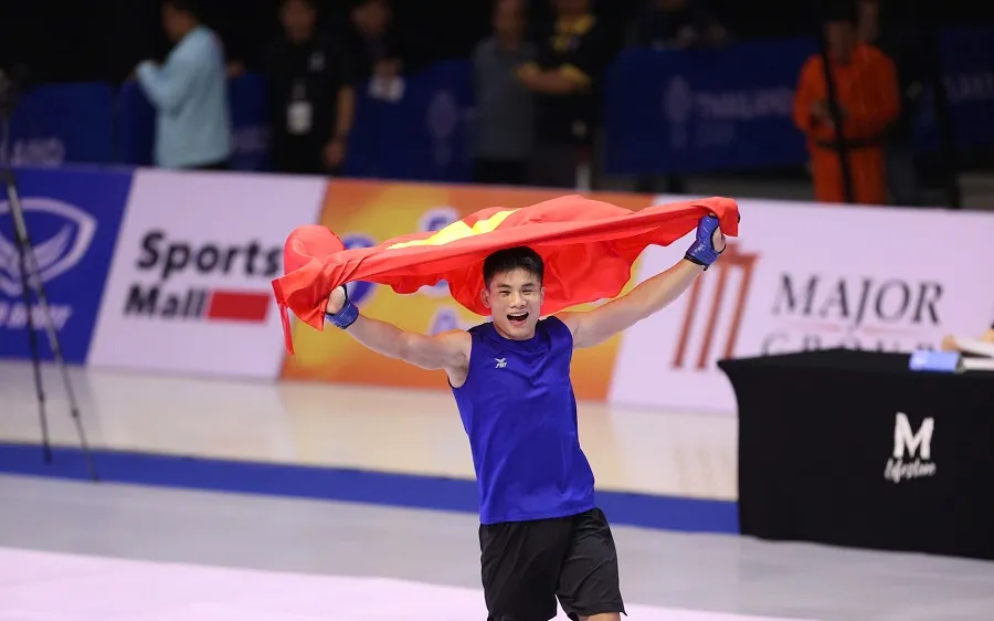 Quàng Văn Minh giành chiến thắng và có HCV tại SEA Games 33-2025. Ảnh: DŨNG PHƯƠNG