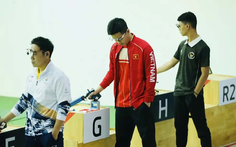 Xạ thủ Phạm Quang Huy của đội tuyển bắn súng Việt Nam. Ảnh: DP