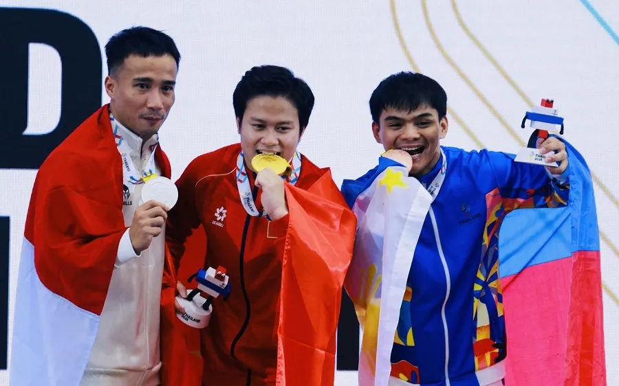 Nguyễn Văn Khánh Phong (giữa) đang là đương kim á quân ASIAD nội dung vòng treo đơn môn nam. Ảnh: DŨNG PHƯƠNG