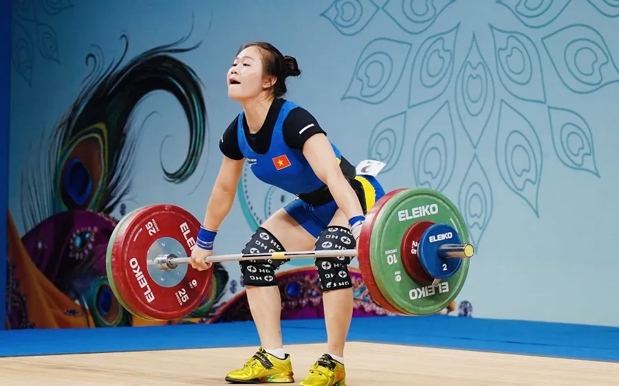 Lực sĩ Quàng Thị Tâm thi đấu tại Ấn Độ. Ảnh: AWF