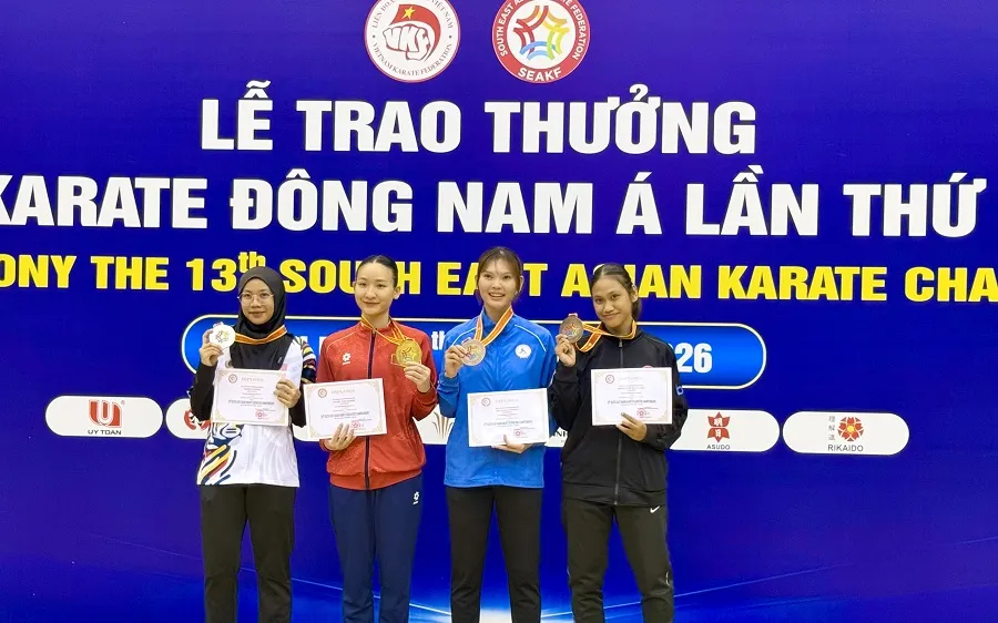 Võ sĩ Hoàng Thị Mỹ Tâm (áo đỏ) vừa giành HCV tại Giải vô địch Đông Nam Á 2026 nhưng không kịp tham dự ASIAD 20 vì chấn thương. Ảnh: MINH CHIẾN
